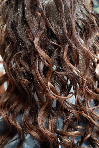 Brown curly hair — Stock Photo, Image