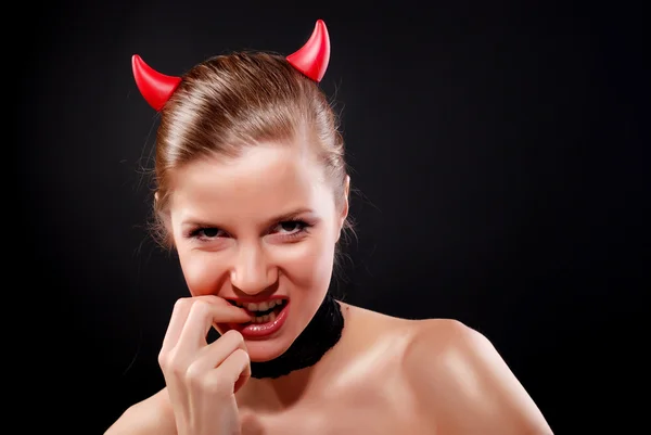 Woman with red horns — Stock Photo, Image