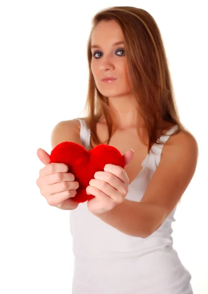 Woman and artificial red heart — Stock Photo, Image