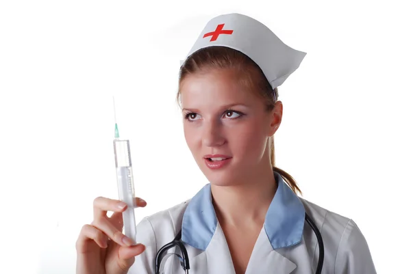 Медсестра со шприцем — стоковое фото