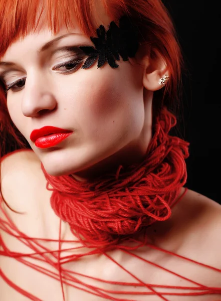 Woman with red clew — Stock Photo, Image