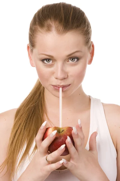Vrouw en de helft van apple — Stockfoto