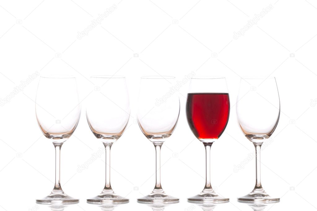 Glasses with red wine on white backgroun