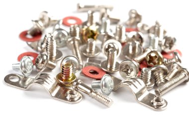 Screws, bolts and nuts on a white backgr clipart