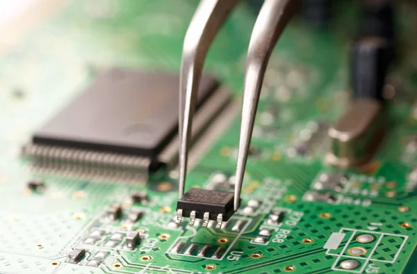 Assembling a circuit board — Stock Photo, Image