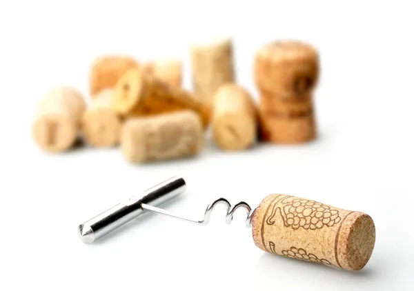 Kurkentrekker en wijnkurken — Stockfoto