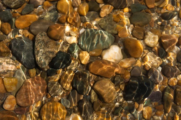 Piedra bajo el agua —  Fotos de Stock