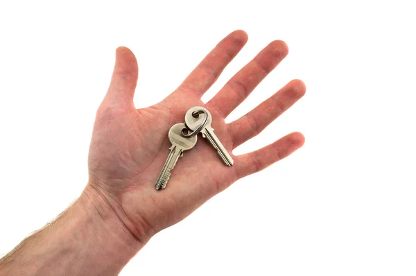 Duas chaves na palma da mão — Fotografia de Stock