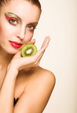 Woman with kiwi on white clipart