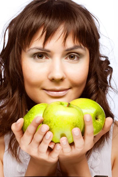 Flicka med färska tre gröna äpplen — Stockfoto