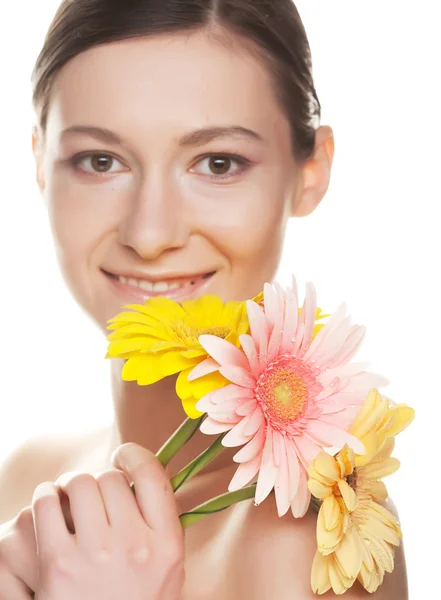 Kobieta z gerber kwiat — Zdjęcie stockowe