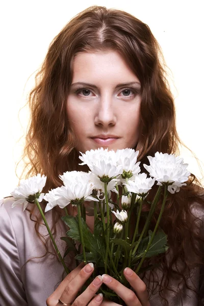 Kvinna med rosa blommor — Stockfoto