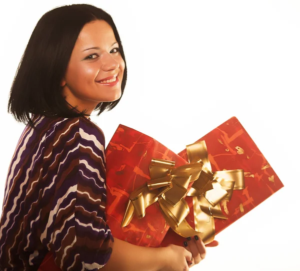 Sexy smiling girl holding a gift — Stock Photo, Image