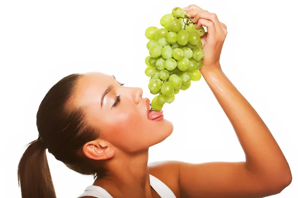 Mulher com uva verde — Fotografia de Stock