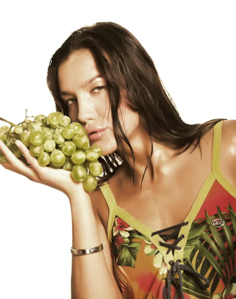 Woman with bunch of grapes — Stock Photo, Image