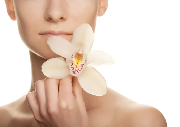 Kızı tutan orkide çiçek — Stok fotoğraf