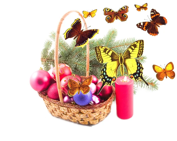 Yellow basket and butterflies — Stock Photo, Image