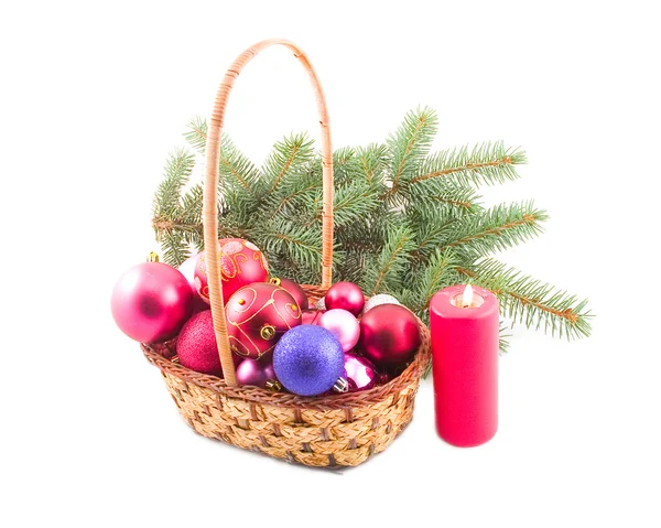 Ornaments in yellow basket — Stock Photo, Image
