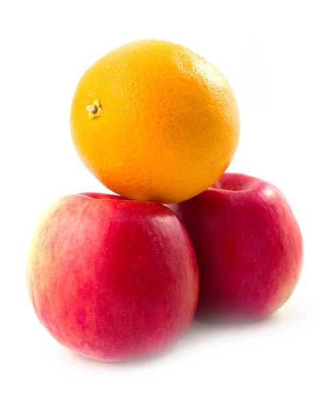 Oranje op appelen — Stockfoto