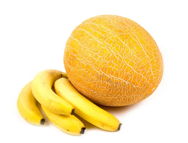 Gelbe Bananen und Melonen — Stockfoto