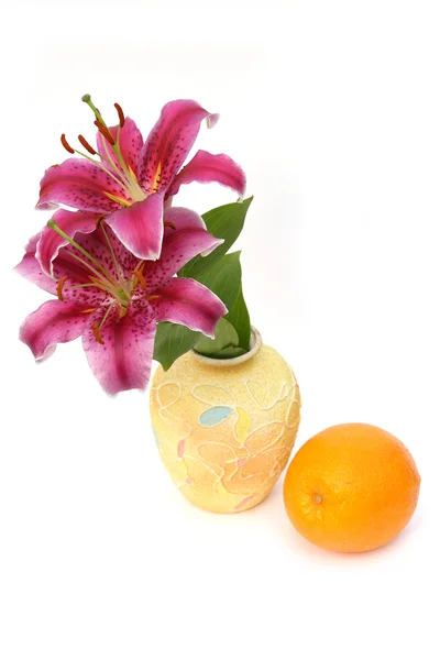 Yellow vase and orange — Stock Photo, Image