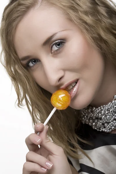 Young blond with caramel isolated on whi — Stock Photo, Image