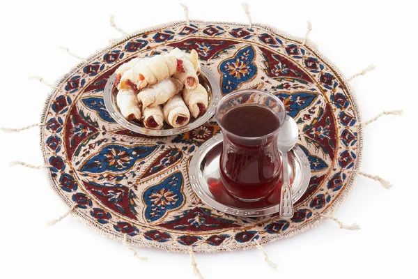 stock image Tea and cookies served on the qalamkar