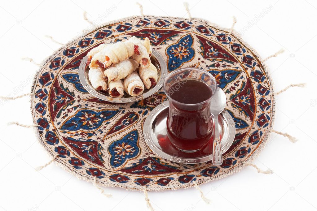 Tea and cookies served on the qalamkar