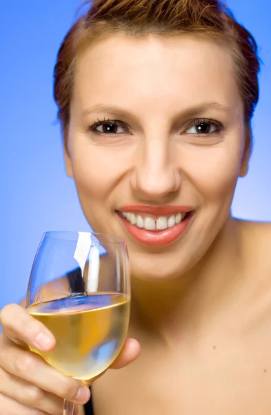 Beautiful woman with glass of white wine — Stock Photo, Image