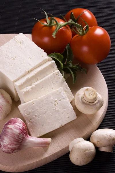 Slices of fresh feta cheese — Stock Photo, Image