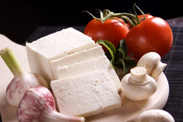 Fatias de queijo branco fresco — Fotografia de Stock