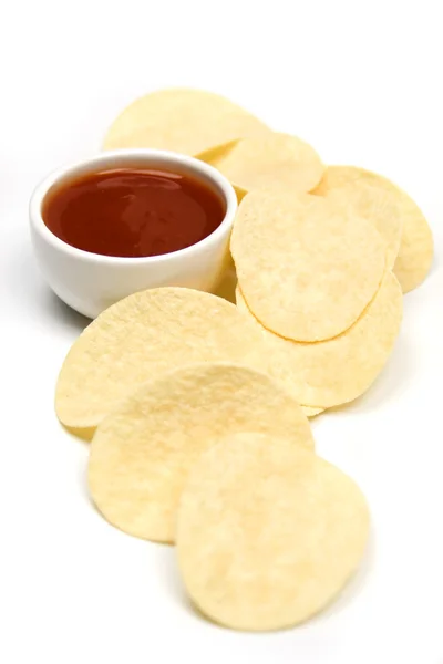 Potato chips and salsa dip — Stock Photo, Image