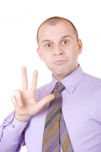 Бізнесмен, що показує три пальці — стокове фото