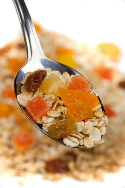 Fruit muesli in a spoon — Stock Photo, Image