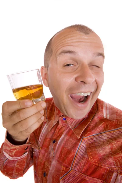 П'яний чоловік тримає склянку віскі — стокове фото
