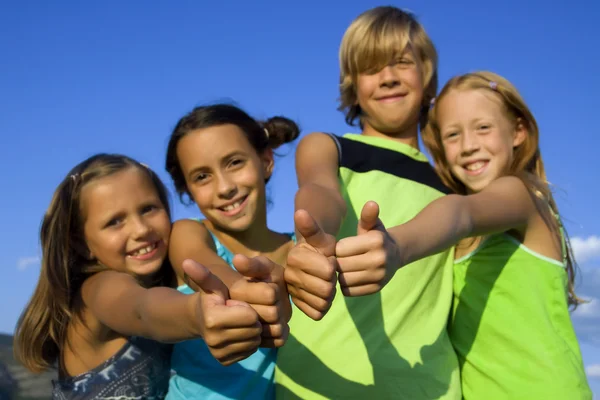 Four very positive kids — Stock Photo, Image