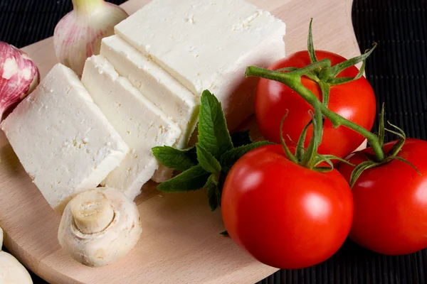 White cheese with tomato — Stock Photo, Image