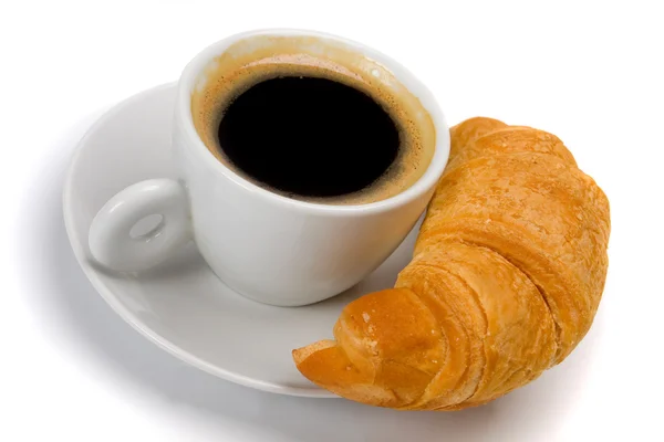 Šálek kávy s croissantem — Stock fotografie