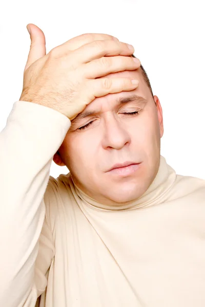 Человек с головной болью — стоковое фото