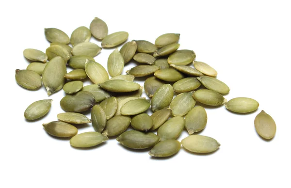 Тыквенное семя, выделенное на белой спине Лицензионные Стоковые Фото