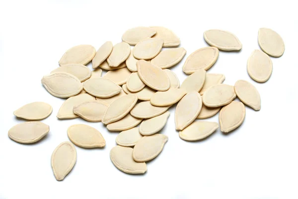 Dýňová semena izolovaných na bílém — Stock fotografie