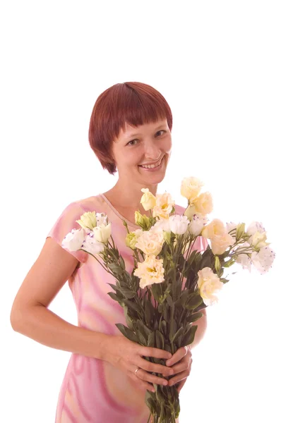 Rusovlasá dívka s květinami — Stock fotografie