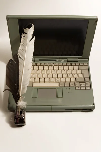 Laptop and written equipment — Stock Photo, Image