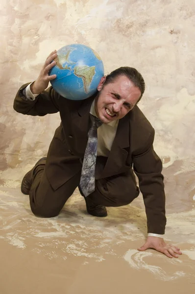 Businessman and globe — Stock Photo, Image