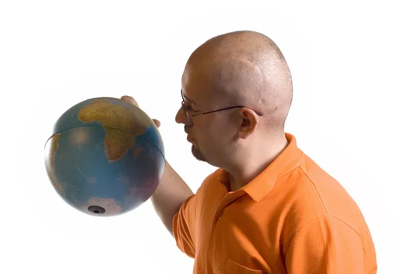 Man met globe — Stockfoto