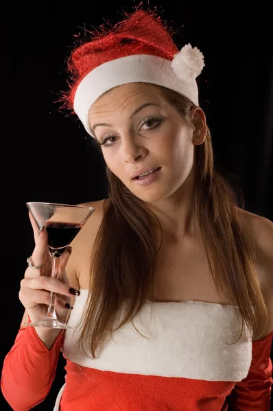 Santa girl drinking — Stock Photo, Image