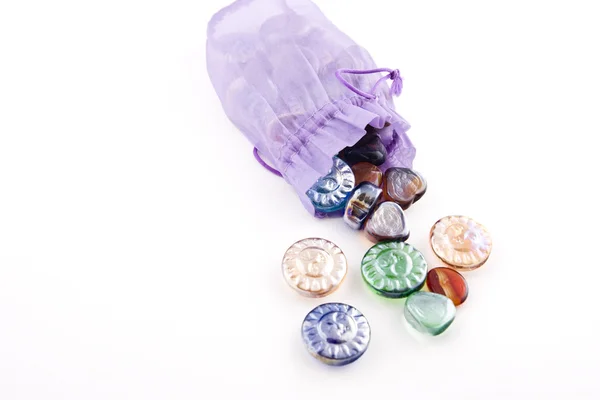 Treasure in a violet pouch — Stock Photo, Image