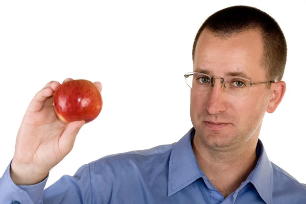 Hombre sosteniendo manzana roja — Foto de Stock