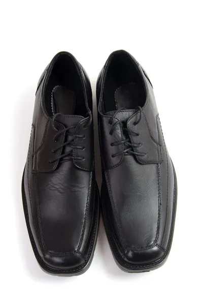Schwarze klassische Schuhe lizenzfreie Stockfotos