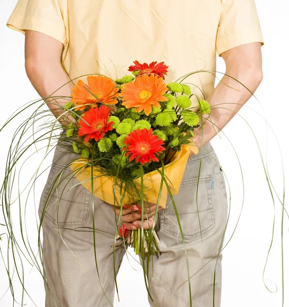 Man keeps bouquet — Stock Photo, Image